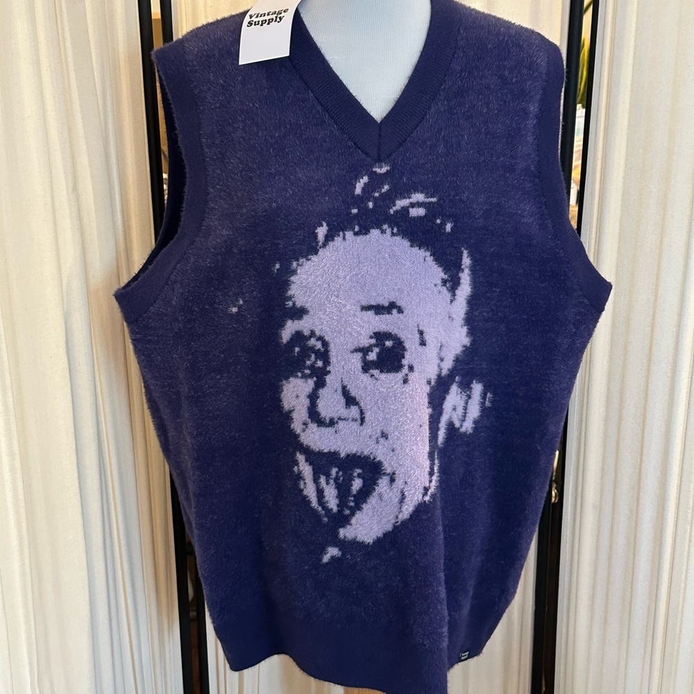 Bold Blue and Purple V-Neck Sweater with Playful Graphic